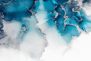 Marble ink abstract art from exquisite original painting for abstract background . Painting was painted on high quality paper texture to create smooth marble background pattern of ombre alcohol ink . © InfiniteFlow