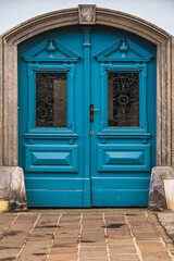Historic blue turquoise door on a building in austria