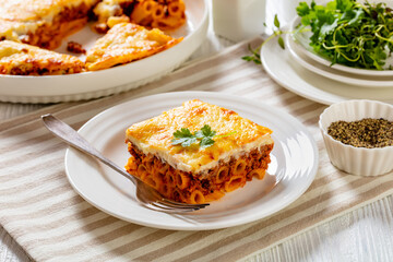 Greek Pastitsio on white plate, top view