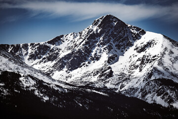 Fototapeta na wymiar Rocky Mountain Winter Scene with High Contrast
