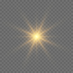 Yellow glowing light explodes on a transparent background. Bright Star. The star burst with brilliance. Golden Light effect. A flash of sunshine with rays.
