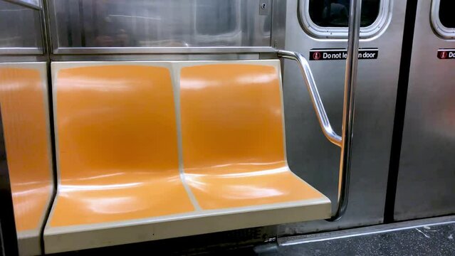 Subway train speeding up along the railway