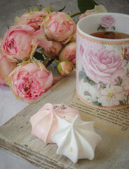 pink roses, china and candle