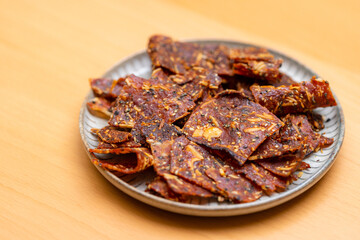 Pile of sliced crispy pork jerky