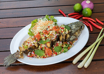 Fried Snakehead Fish in Spicy Herb Salad