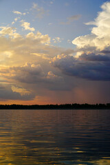 Naklejka na ściany i meble Expressive summer sunset on the Volga river.
