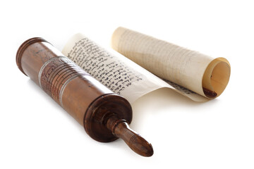 The Scroll of Esther and Purim Festival objects on a dark wooden table. Rustic.