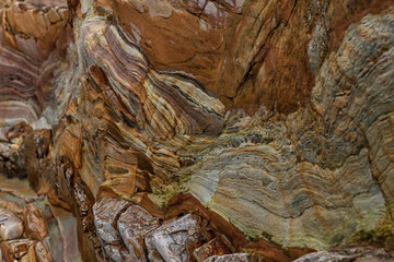 Detail of a limestone cliff with alternate layers of limestone and quartzite on the coastline of Northern Spain