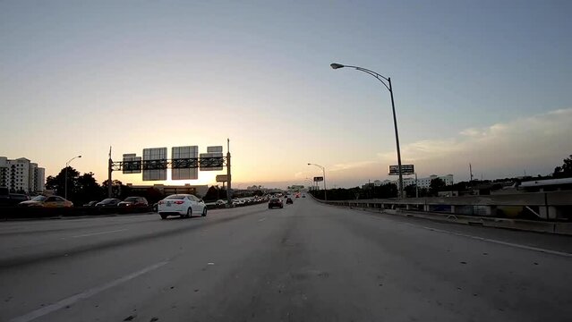 Time Lapse of moving car on the interstate at sunset