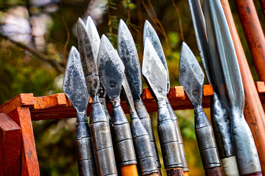 Iron spearheads of various shapes with wooden handles