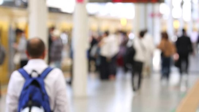 Blurry Metro Train Station Platform in Tokyo. Underground Metro Train Station During Rush Hour. People Leaving Station and Walking on Platform