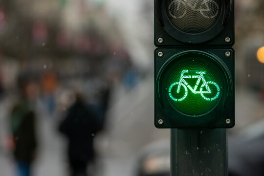 Sustainable transport. Bicycle traffic signal, green light, road bike, free bike zone or area, bike friendly, close up