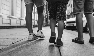 walking on the street. black and white toned image 