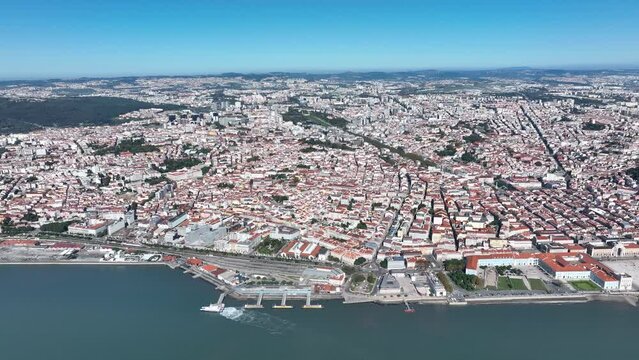 Lisbon Skyline. Downtown and Old Town in Background. Portugal. 4k. Drone Point of View.