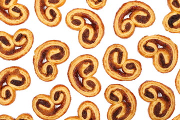 Puff pastry with butter and cinnamon isolated on white, top view