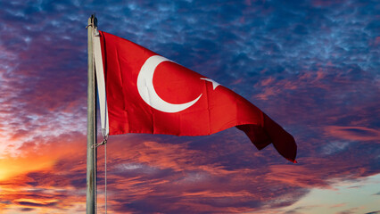 Turkish flag. Turkish flag and dramatic sunset sky. Turkish National holidays concept. 23 Nisan, 19...