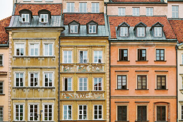 Fototapeta na wymiar Facades of historic buildings in downtown of Warsaw, Poland