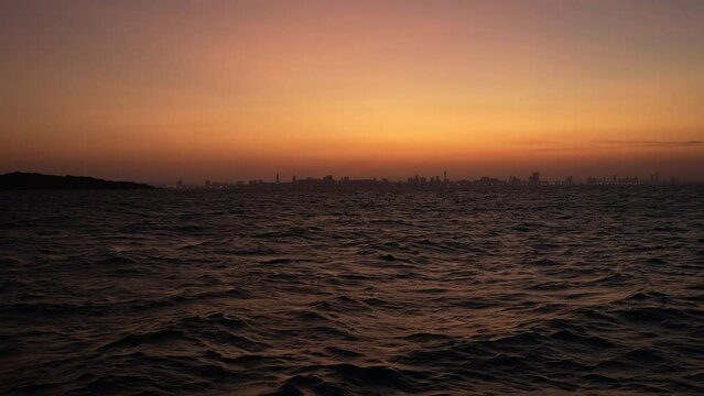 View Pattaya city before sunrise from Koh Larn Island in morning 