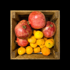 wooden box or grocery basket with grapefruit and tangerines. Grocery set. Top view