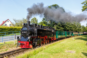 Fototapeta na wymiar Rasender Roland steam train locomotive railway in Sellin, Germany