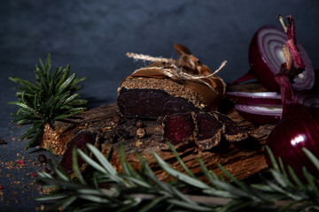 Homemade cured meat with spices, onions and fragrant slaw
