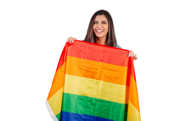 Horizontal photo. Beautiful Brazilian woman, with casual clothes, Jeans and green shirt. holding lgbt flag.