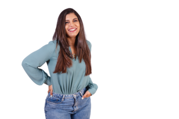 Horizontal photo. Beautiful Brazilian woman, with casual clothes, Jeans and green shirt. hands in pocket smiling.