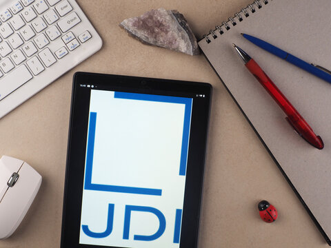 GarhIn this photo illustration,  Japan Display Inc.  logo seen displayed on a tablet.