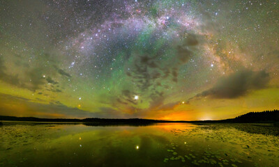Obraz na płótnie Canvas Starry night at a beautiful lake