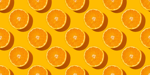 Oranges pattern. Citrus fruits on an orange background.