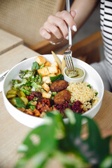 Taking croissants out of oven