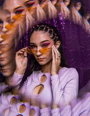 euphoria inspired editorial photo shoot glitter background purple black model caucasian hispanic...