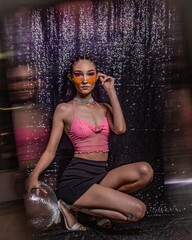 euphoria inspired editorial photo shoot glitter background purple black model caucasian hispanic...