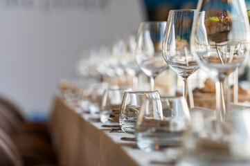 crystal glasses on a served table in a restaurant