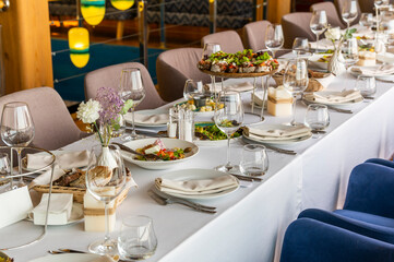 a large table with a tablecloth served