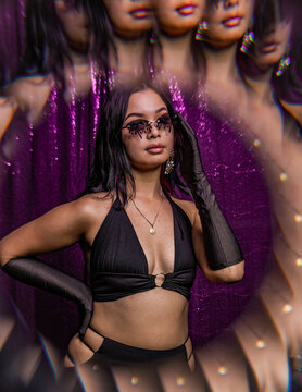 euphoria inspired editorial photo shoot glitter background purple black model caucasian hispanic model fashion photo shoot party dance disco queen ball glasses hairstyle 90s 20s hbo