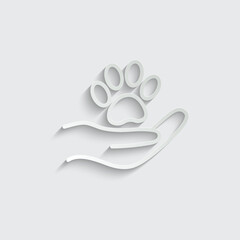 Hand holding paw icon. Animal care and protect