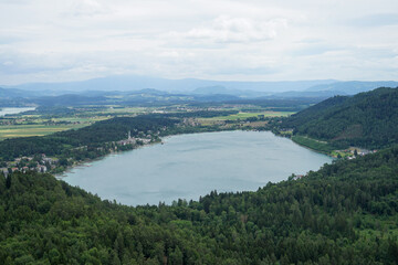 Fototapeta na wymiar View of Lake Klopein from the mountains on a cloudy day, carinthia, austria