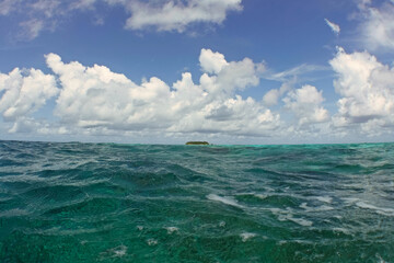 Fototapeta na wymiar Tropical resort island, view from ocean. Maldives