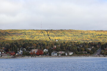 Naklejka premium View of downtown and the autumn trees in Grand Marais, harbor in Northern Minnesota 