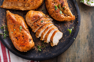 Grilled or roasted chicken breast on a serving plate