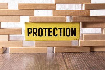 the word of PROTECT on wooden cubes
