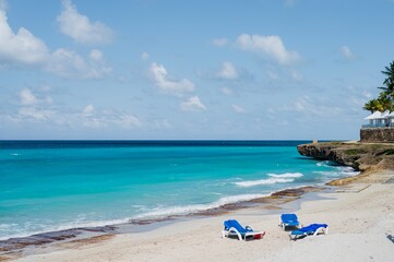 Varadero beach in Cuba in the year 2023. Blue sea, clear sky and many tourists on the beach.