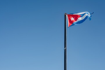 Varadero beach in Cuba in the year 2023. Blue sea, clear sky and many tourists on the beach.