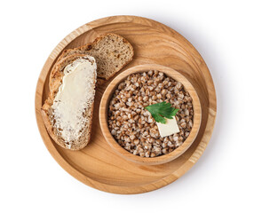 Wooden bowl of tasty buckwheat porridge with butter, bread and dill isolated on white background