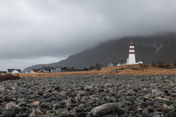 Fototapeta na wymiar Alnes Fyr Lighthouse in Norway on an island in moody weather