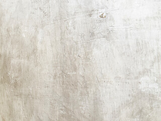 Weathered white cement wall background and texture for modern or retro and vintage interior design