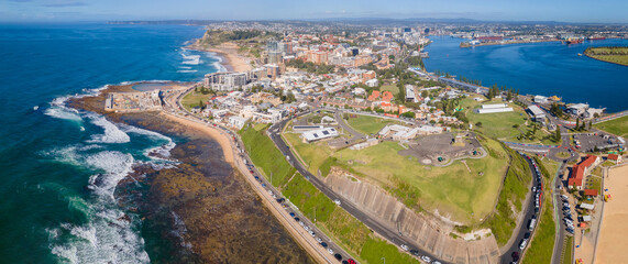 Panoramic aerial drone view of the harbour city of Newcastle and Newcastle Harbour, NSW, Australia...