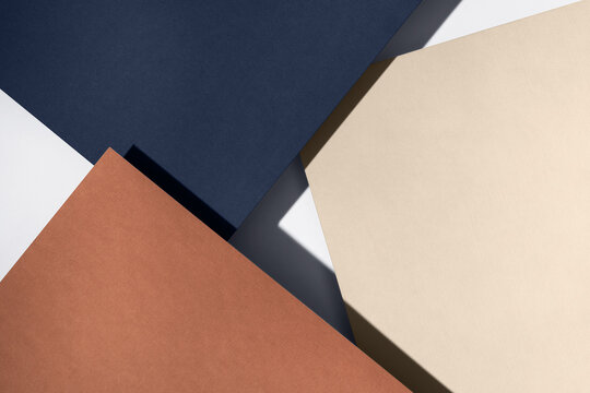 Paper for pastel overlap in ivory, blue and terracotta colors for background, banner, presentation template. Creative trendy background design in natural colors. Background in 3d style.