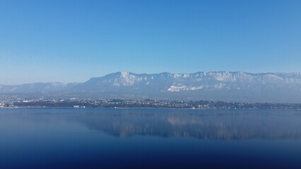 View over a lake. Blue sky and mountain.